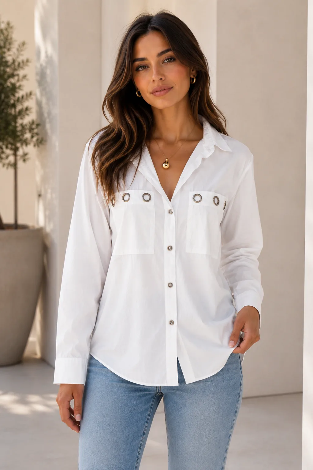 Camisa de poplin liso manga larga con arandelas armería